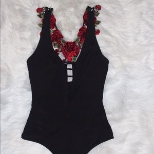 Black body suit with red rose embroidery
